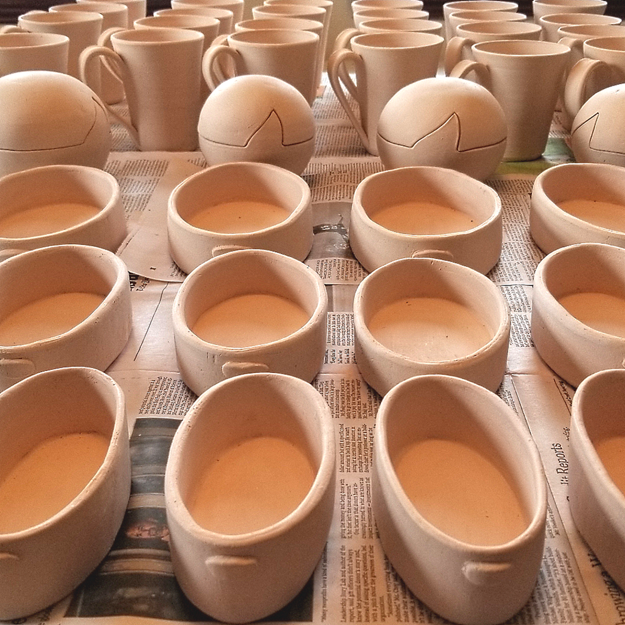 Bisqued stoneware bowls and mugs